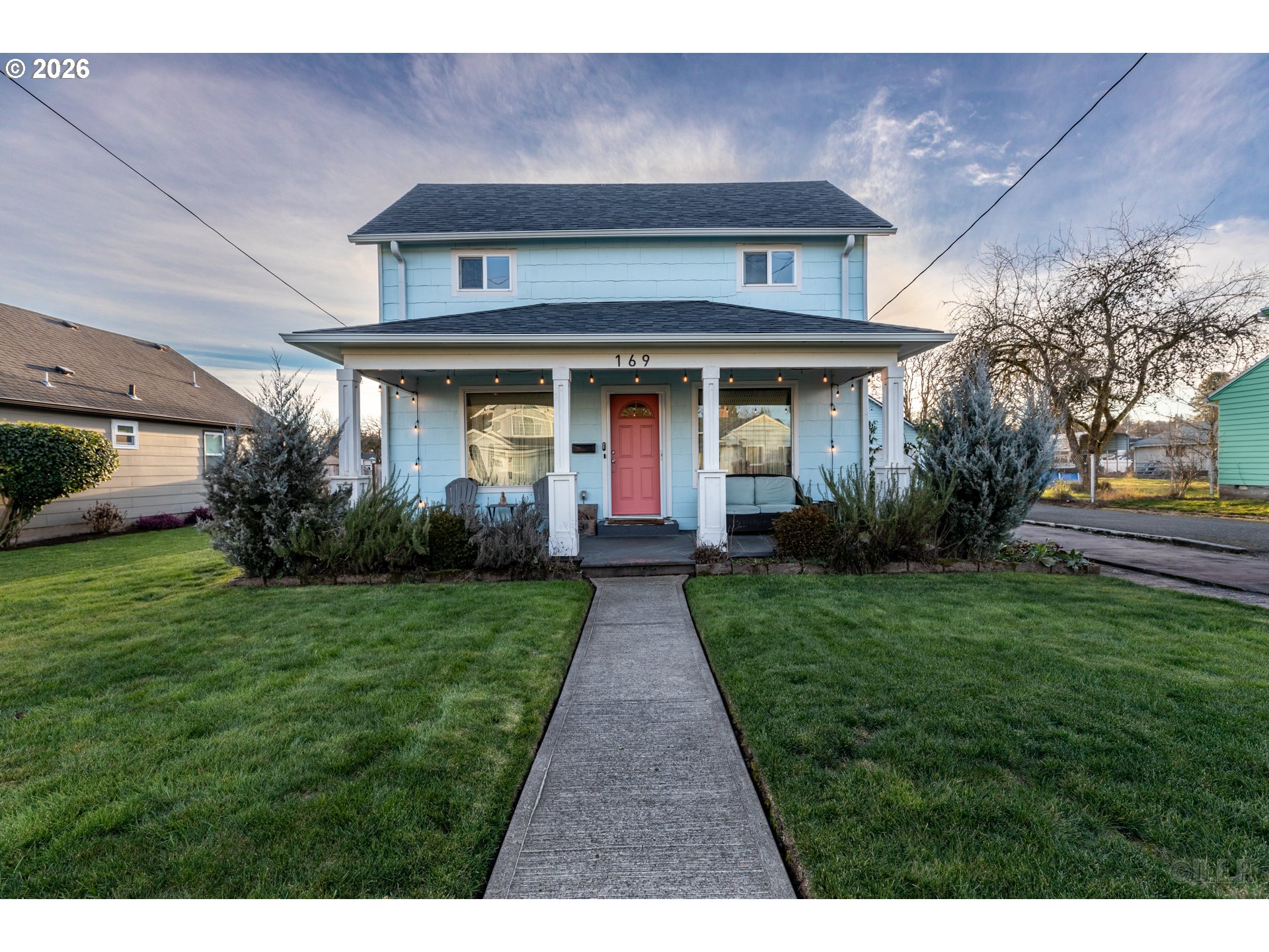 169 North Vernonia Road St. Helens, OR 97051 - Photo 24 of 27 a front view of a house with garden