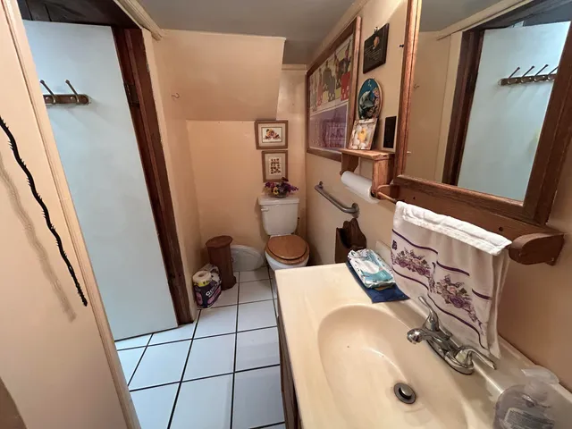 a bathroom with sink and mirror