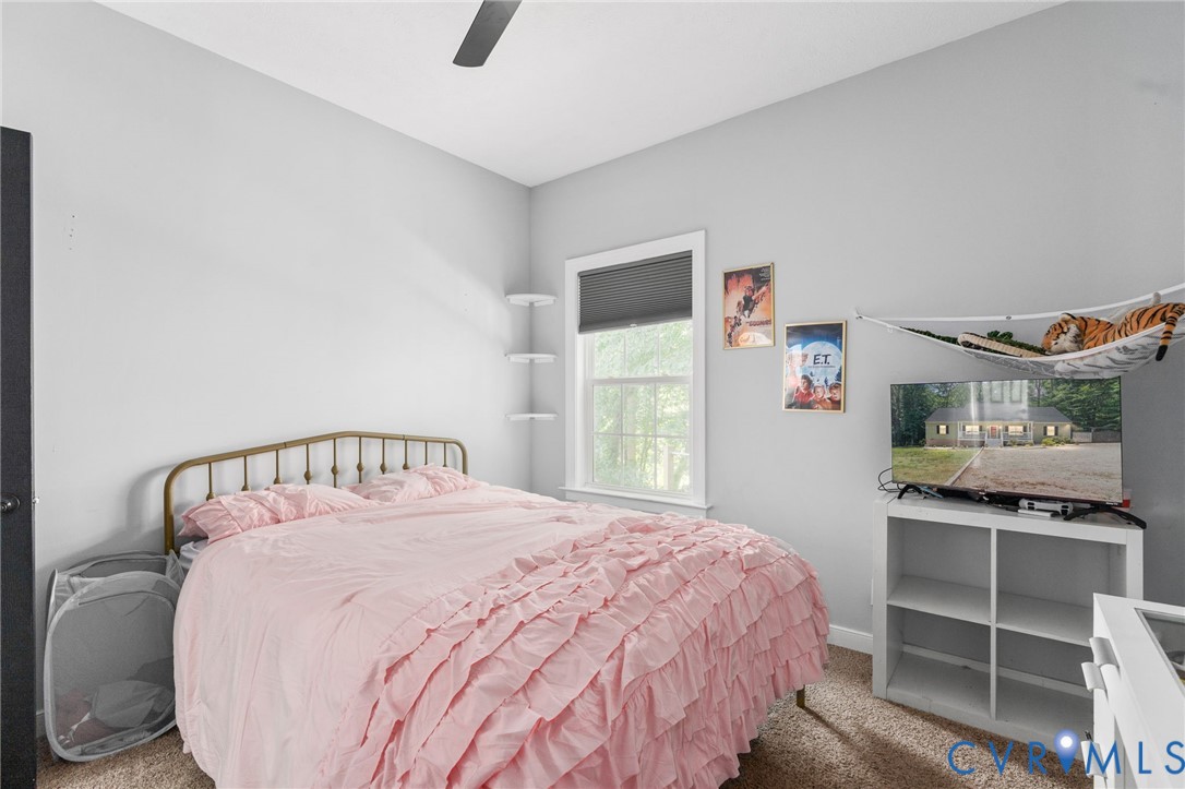 1755 Dispatch Road Quinton, VA 23141 - Photo 49 of 86 a bedroom with a bed and a window