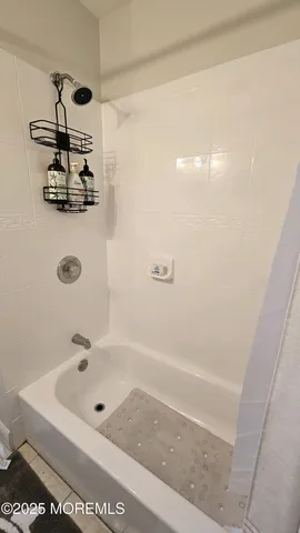 a bathroom with a sink and a shower