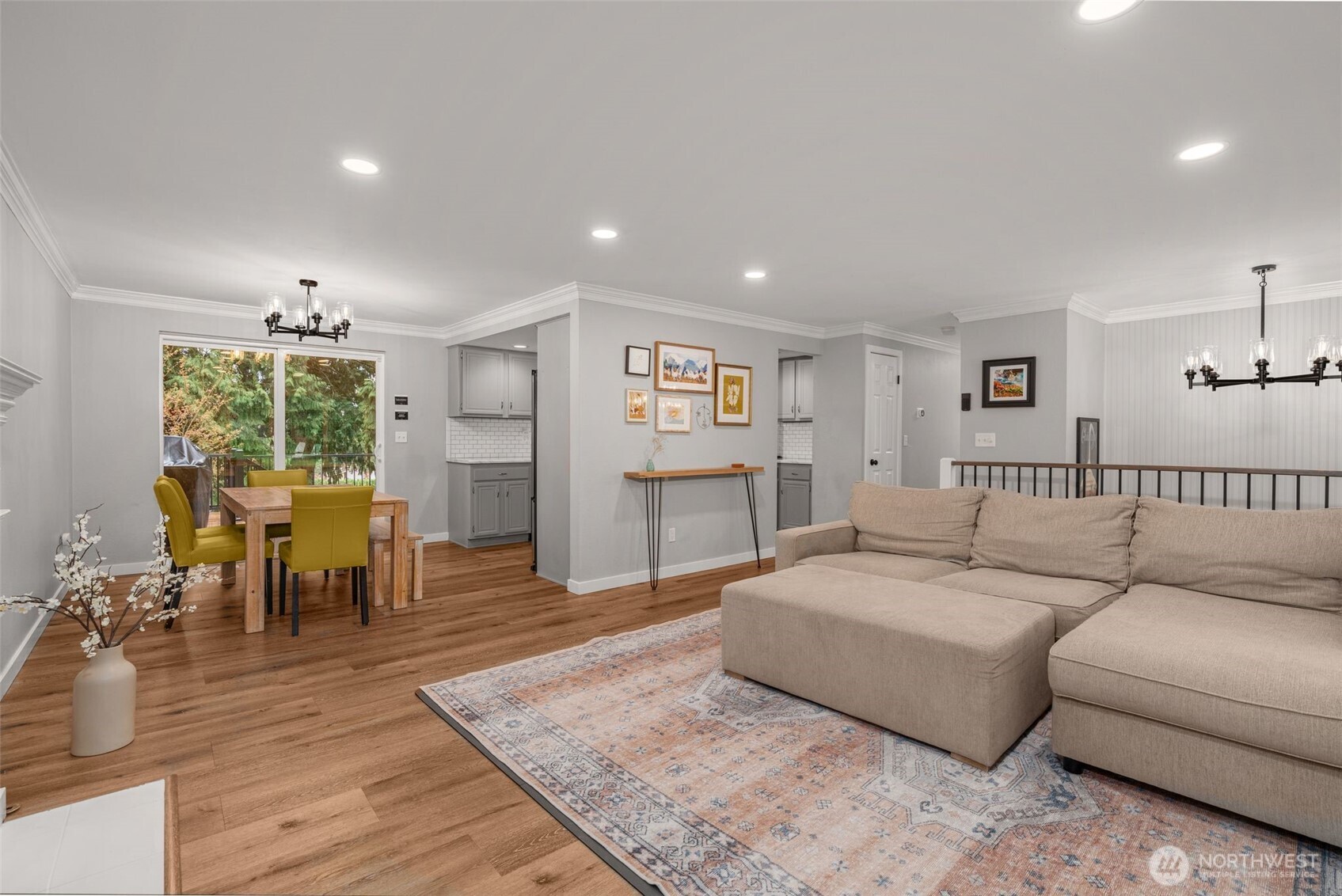 1128 203rd Place Southeast Bothell, WA 98012 - Photo 11 of 38 a living room with furniture and a wooden floor