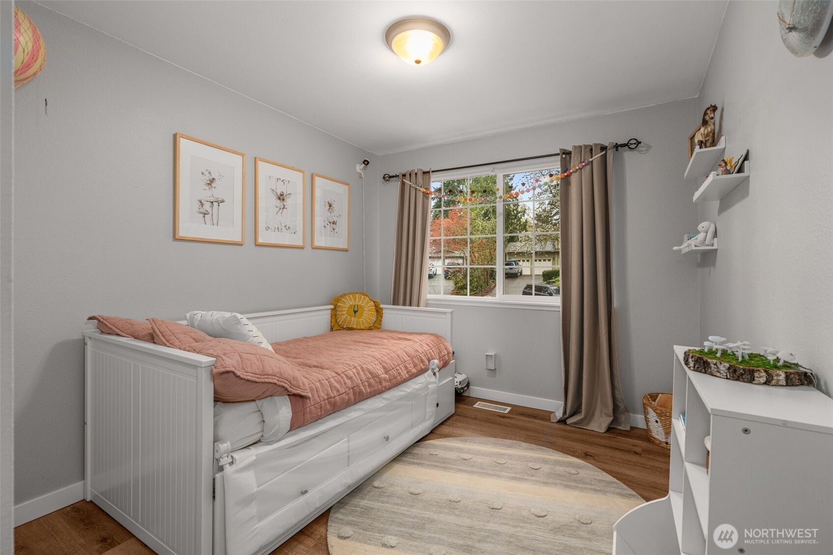 1128 203rd Place Southeast Bothell, WA 98012 - Photo 21 of 38 a bedroom with a bed and a window