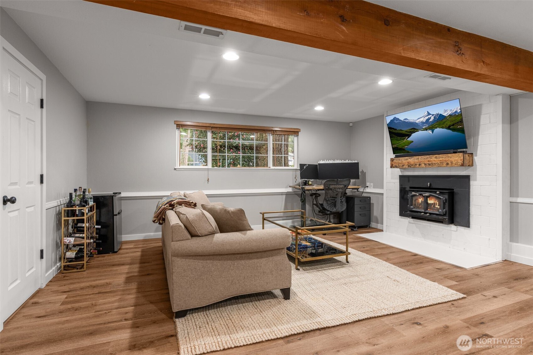 1128 203rd Place Southeast Bothell, WA 98012 - Photo 29 of 38 a living room with furniture and a fireplace