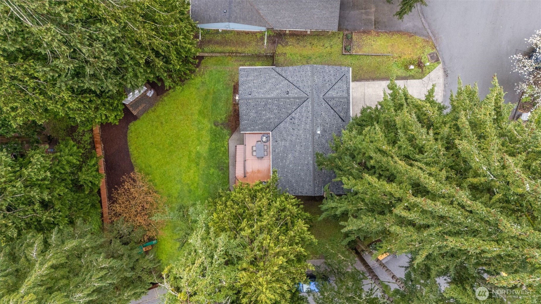 1128 203rd Place Southeast Bothell, WA 98012 - Photo 38 of 38 an aerial view of a house with a yard