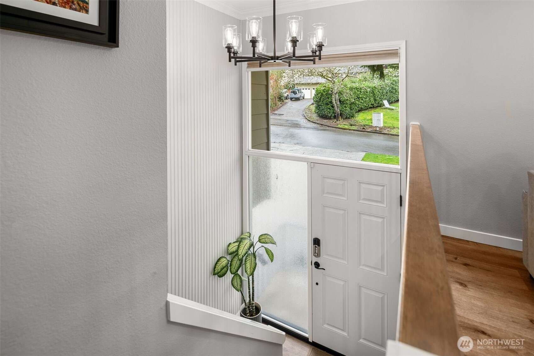 1128 203rd Place Southeast Bothell, WA 98012 - Photo 6 of 38 a view of kitchen with wooden floor