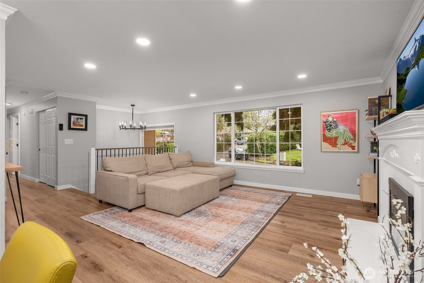 1128 203rd Place Southeast Bothell, WA 98012 - Photo 9 of 38 a living room with furniture and a fireplace