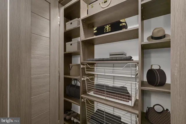 a close view of shoes stand and cabinets