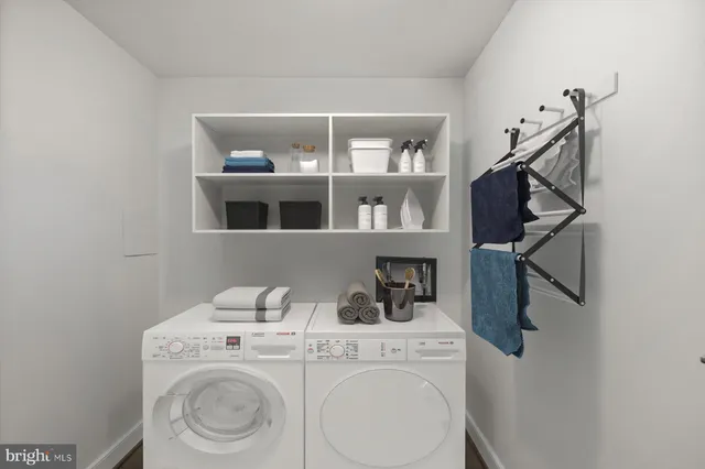 a utility room with dryer and washer