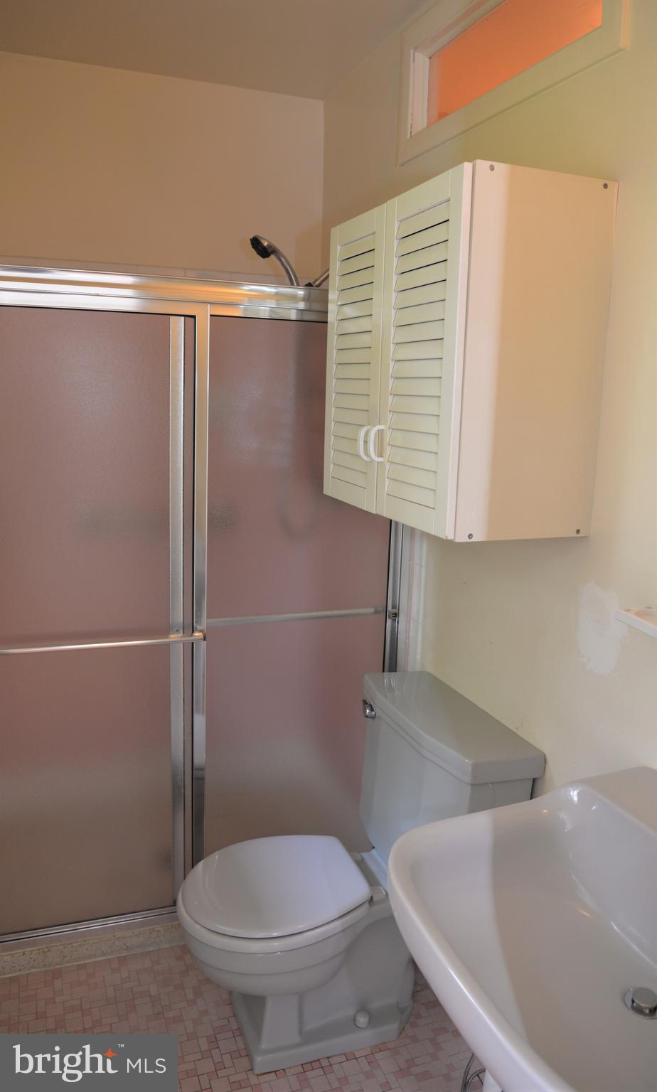 6427 Pima Street Alexandria, VA 22312 - Photo 12 of 30 a bathroom with a toilet and a sink