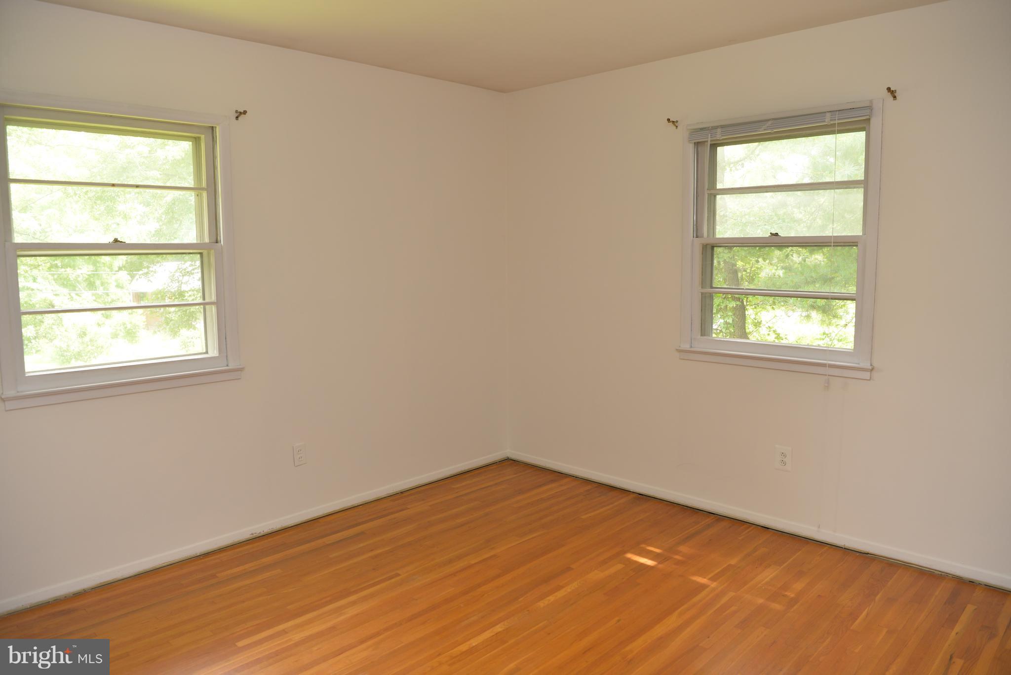 6427 Pima Street Alexandria, VA 22312 - Photo 13 of 30 an empty room with a window
