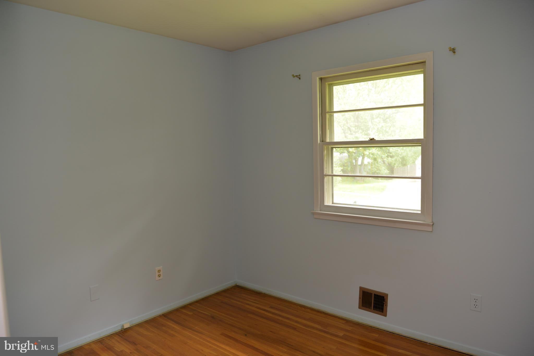 6427 Pima Street Alexandria, VA 22312 - Photo 15 of 30 an empty room with a window