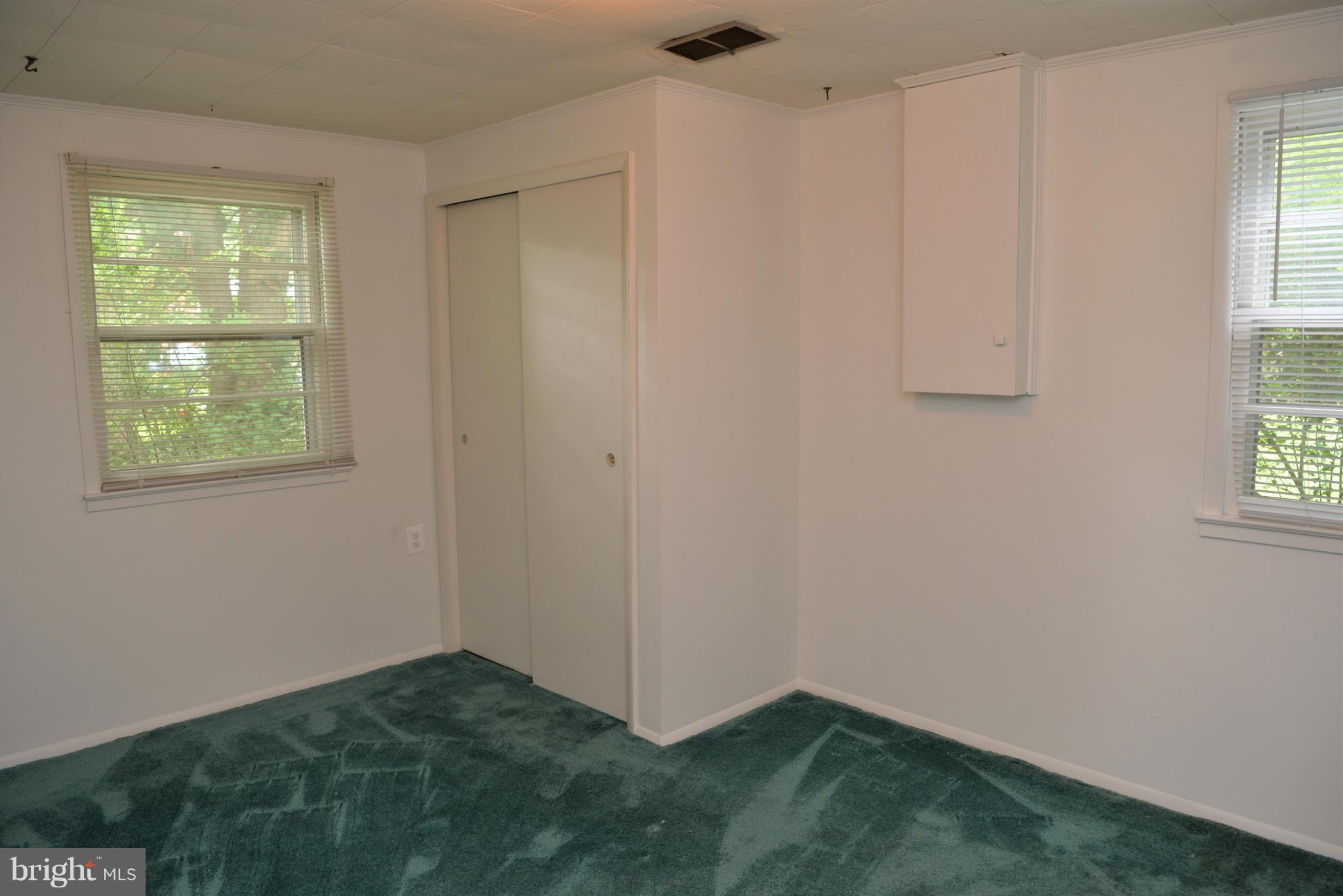 6427 Pima Street Alexandria, VA 22312 - Photo 19 of 30 a view of an empty room with a window