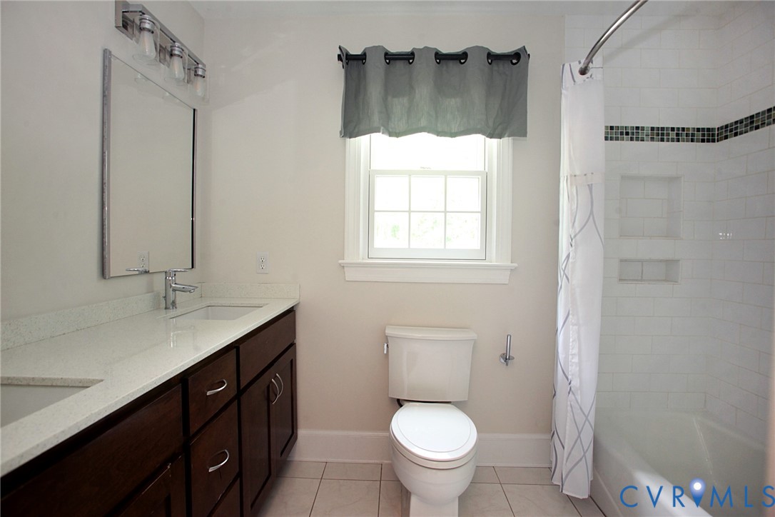 231 Hazelmere Drive Chesterfield, VA 23236 - Photo 21 of 33 a bathroom with a sink toilet and mirror