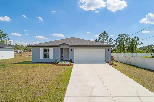 a view of swimming pool with an outdoor seating