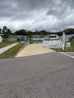 a view of a garden with a lake