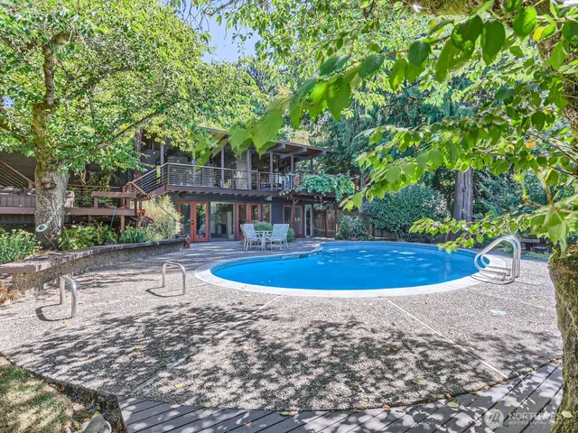 a view of a swimming pool with an outdoor space