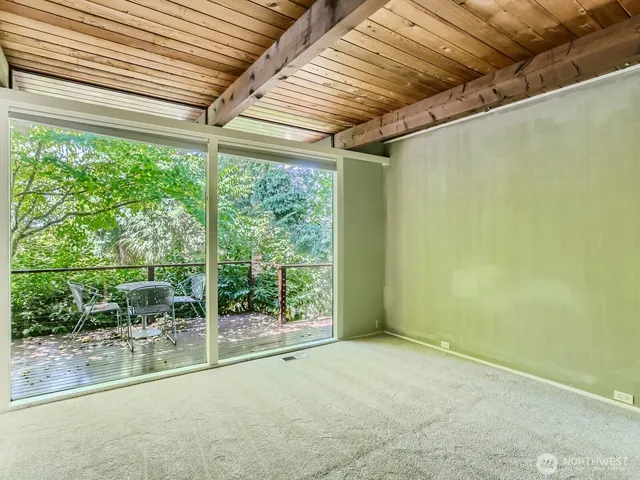 a view of a room with porch and outdoor space