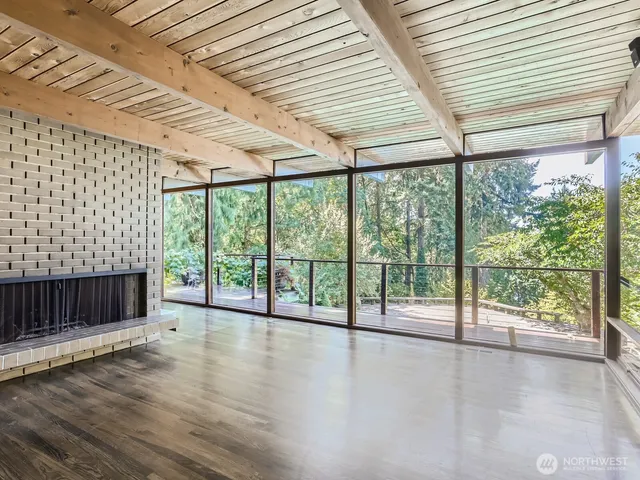 a view of hallway with a large window
