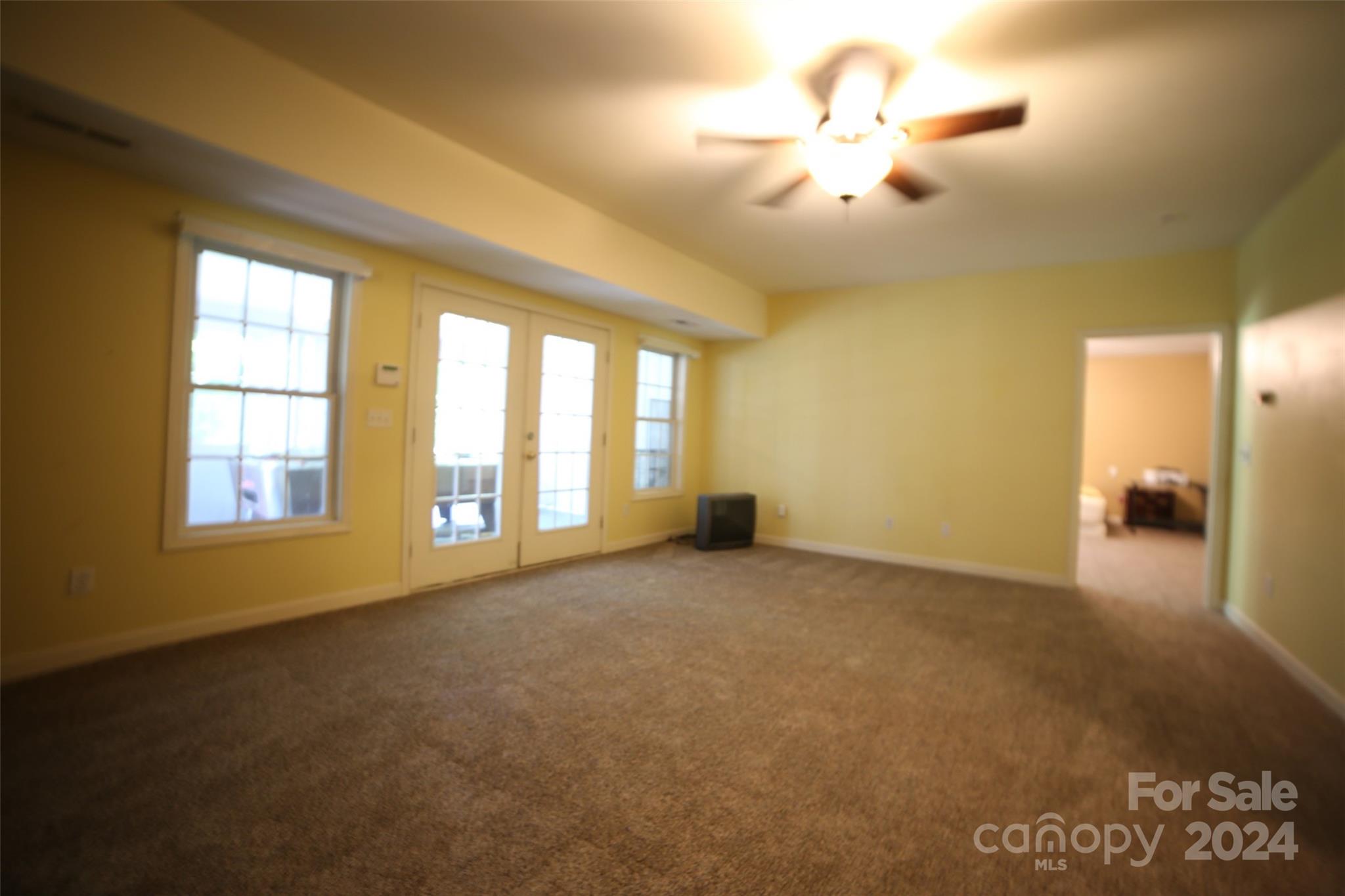 1117 Blacksnake Road Stanley, NC 28164 - Photo 18 of 27 a view of an empty room with a window