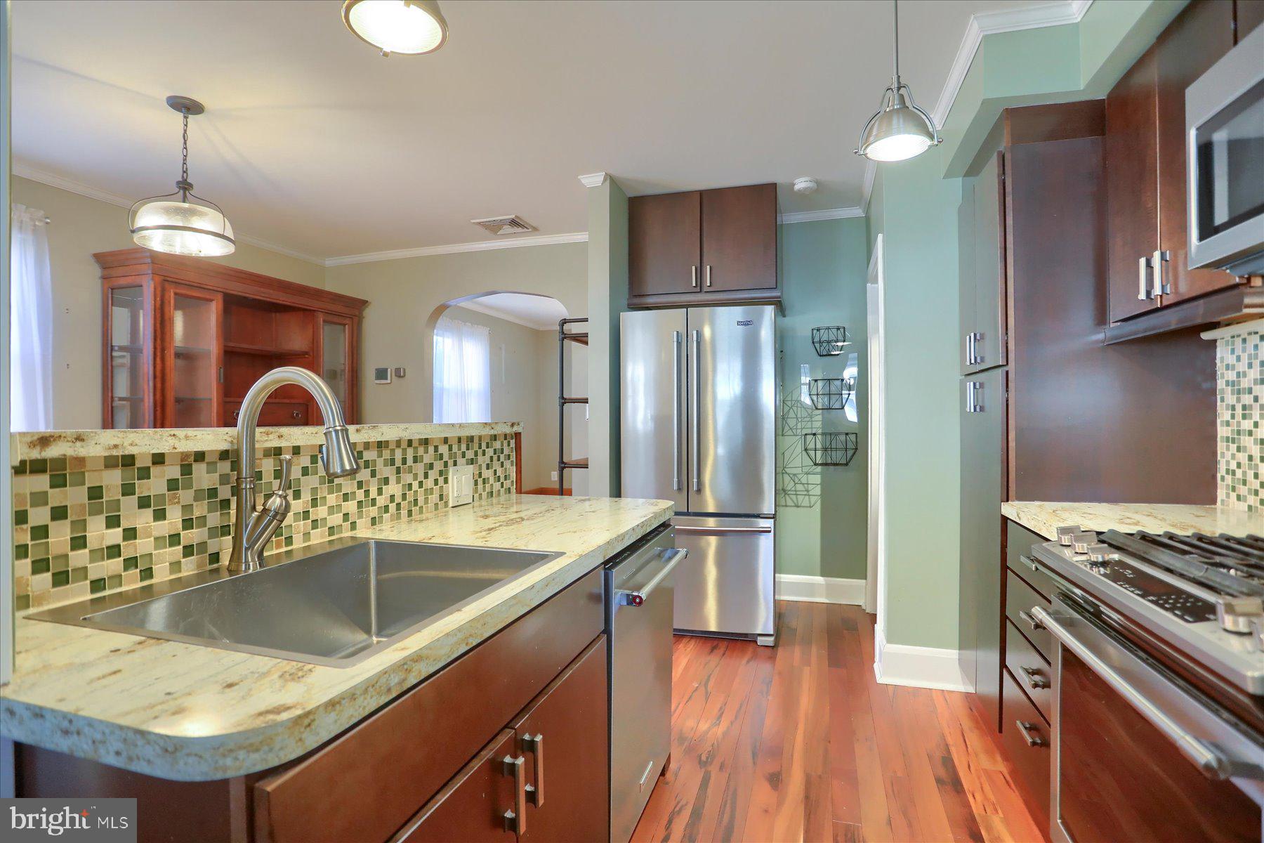 2616 Liberty Parkway Baltimore, MD 21222 - Photo 13 of 41 a kitchen with a sink appliances and cabinets