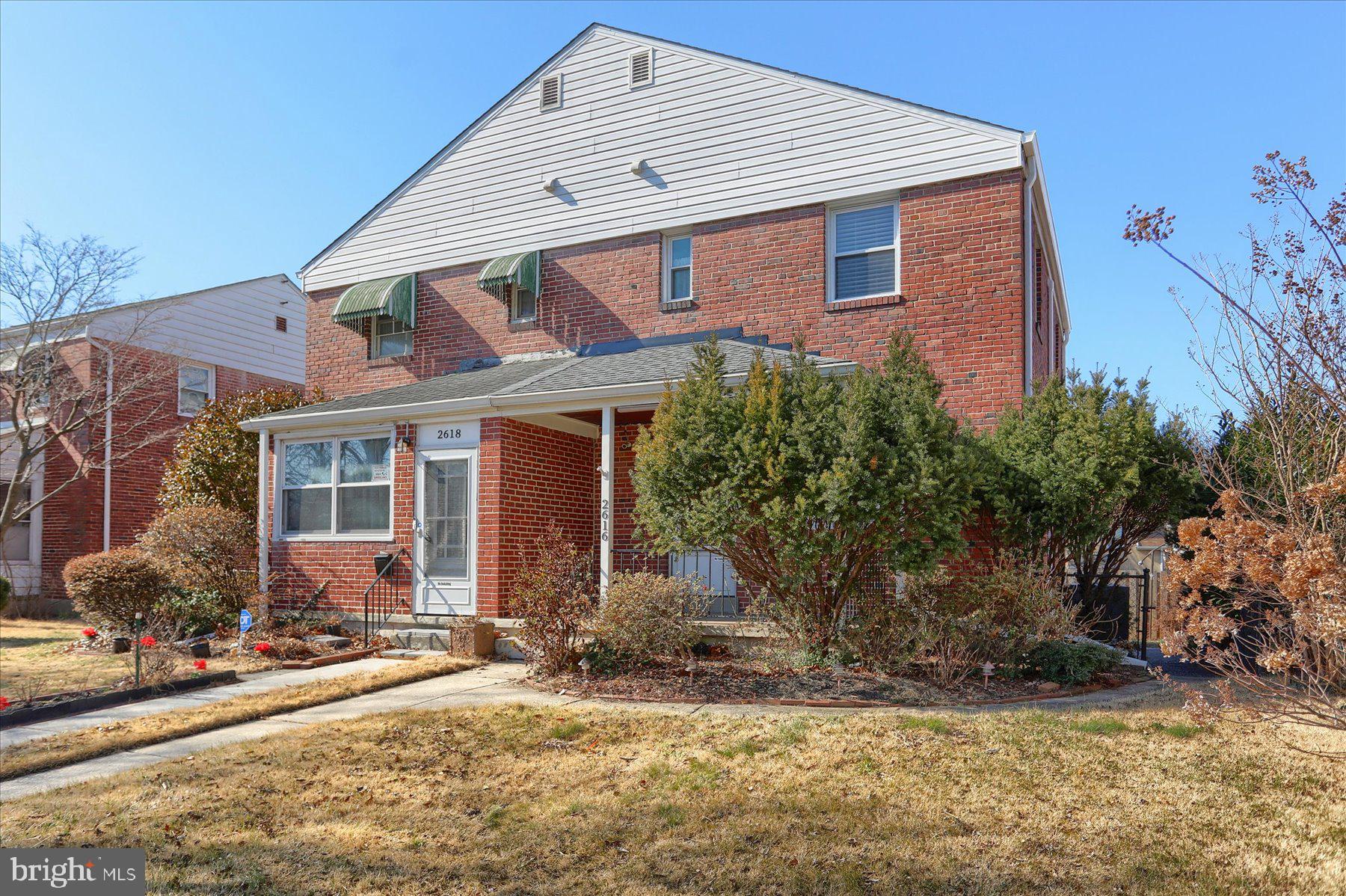 2616 Liberty Parkway Baltimore, MD 21222 - Photo 35 of 41 a front view of a house with a yard