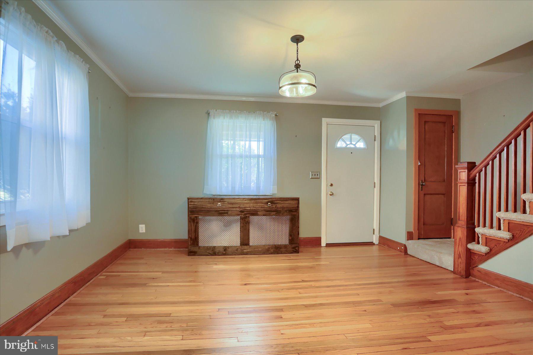 2616 Liberty Parkway Baltimore, MD 21222 - Photo 7 of 41 a room with a window and chandelier