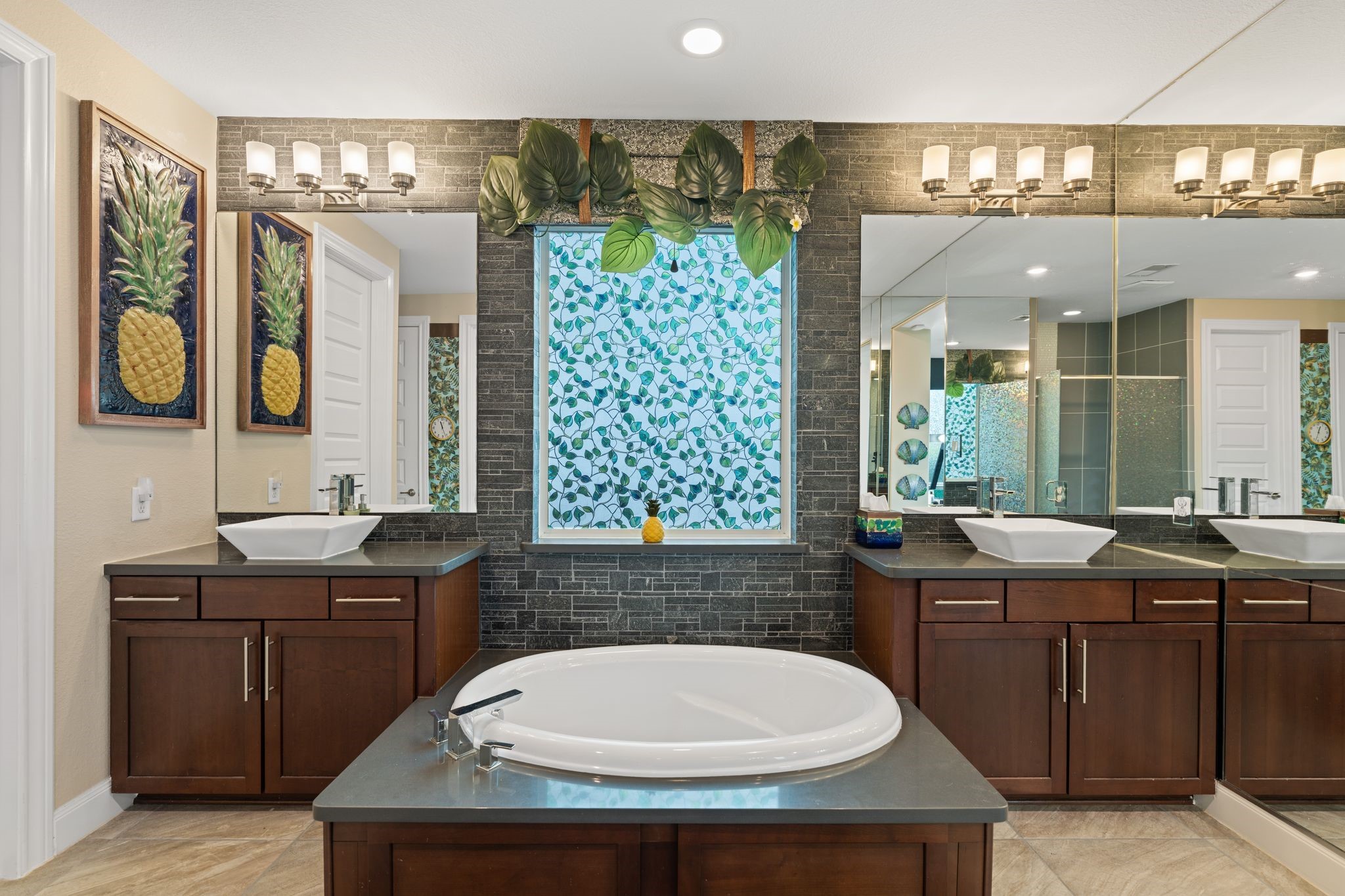 51 Scepter Ridge Sugar Land, TX 77498 - Photo 27 of 48 a bathroom with a granite countertop sink a large mirror and a bathtub