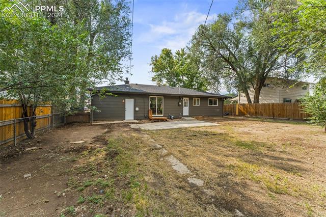 1911 Monterey Road Colorado Springs, CO 80910 - Photo 29 of 30 Back of house with a patio area