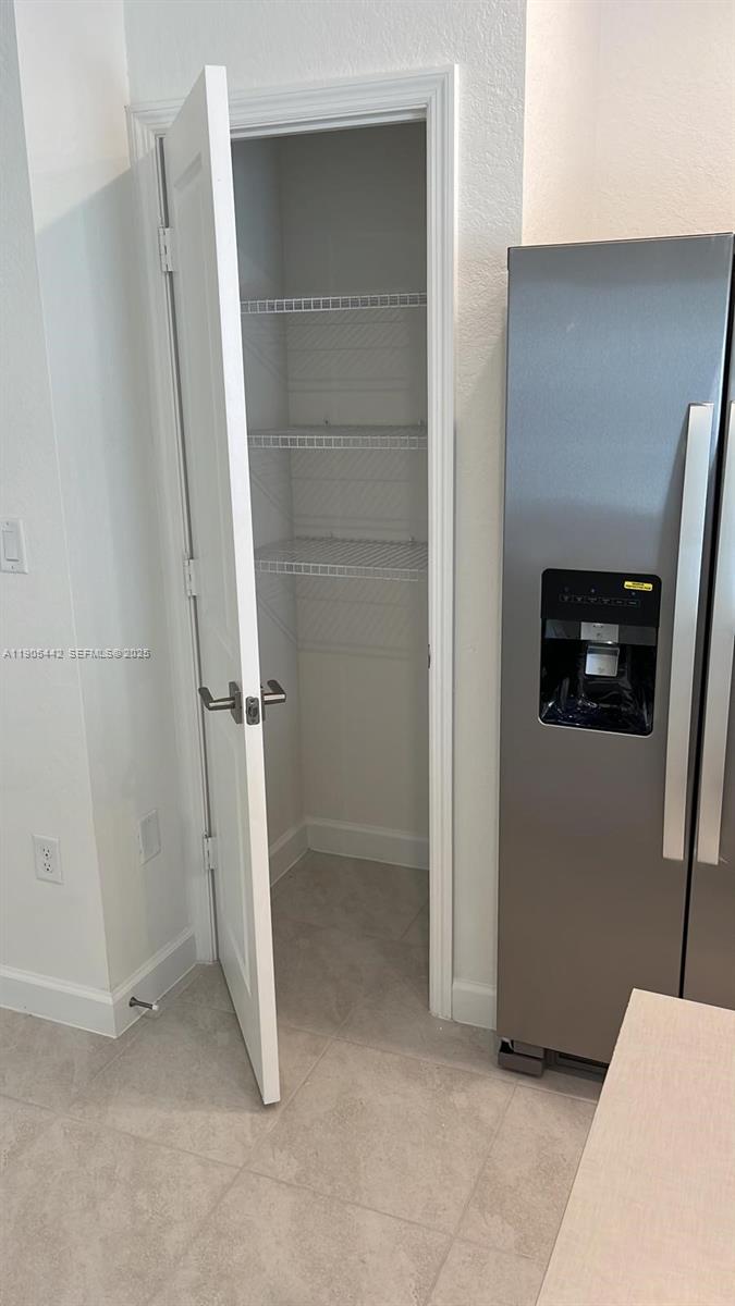 606 Southwest 12th Avenue Homestead, FL 33030 - Photo 16 of 20 a view of an empty room