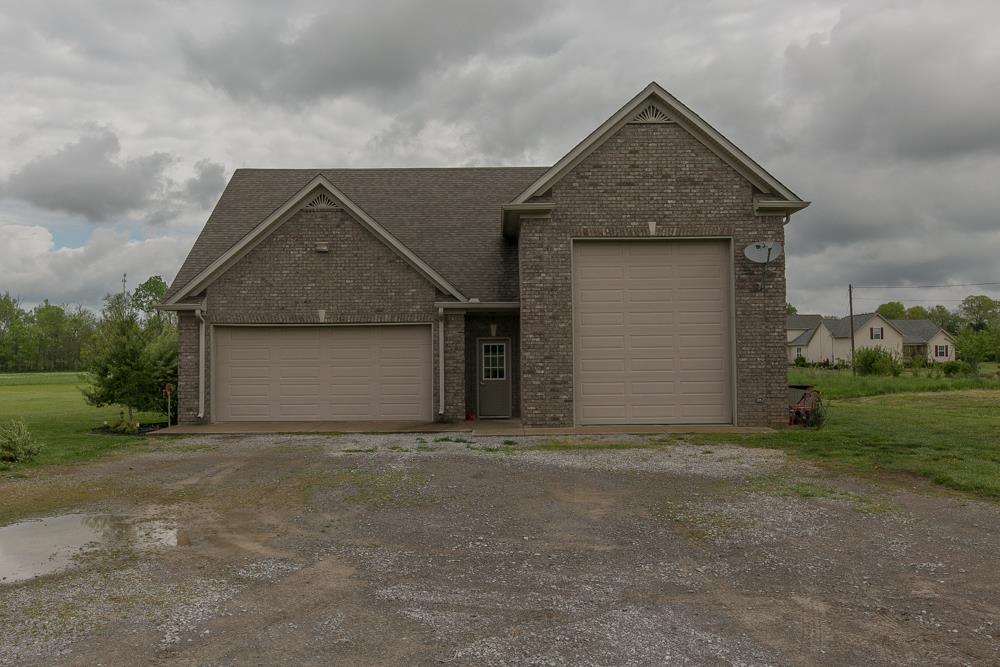 4703 Alsup Mill Road Lascassas, TN 37085 - Photo 7 of 30 a front view of a house with a yard