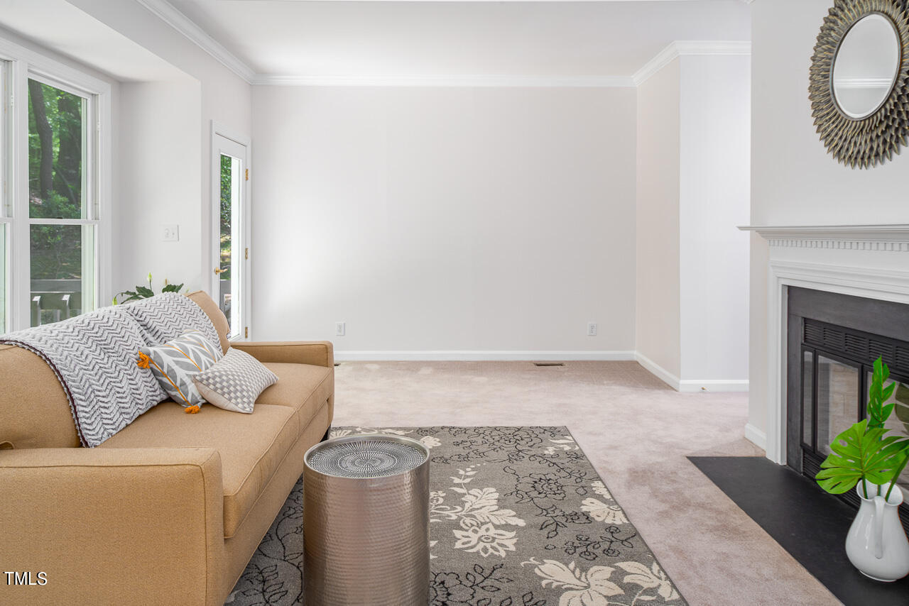 479 Beechmast Pittsboro, NC 27312 - Photo 13 of 22 a living room with furniture and a fireplace