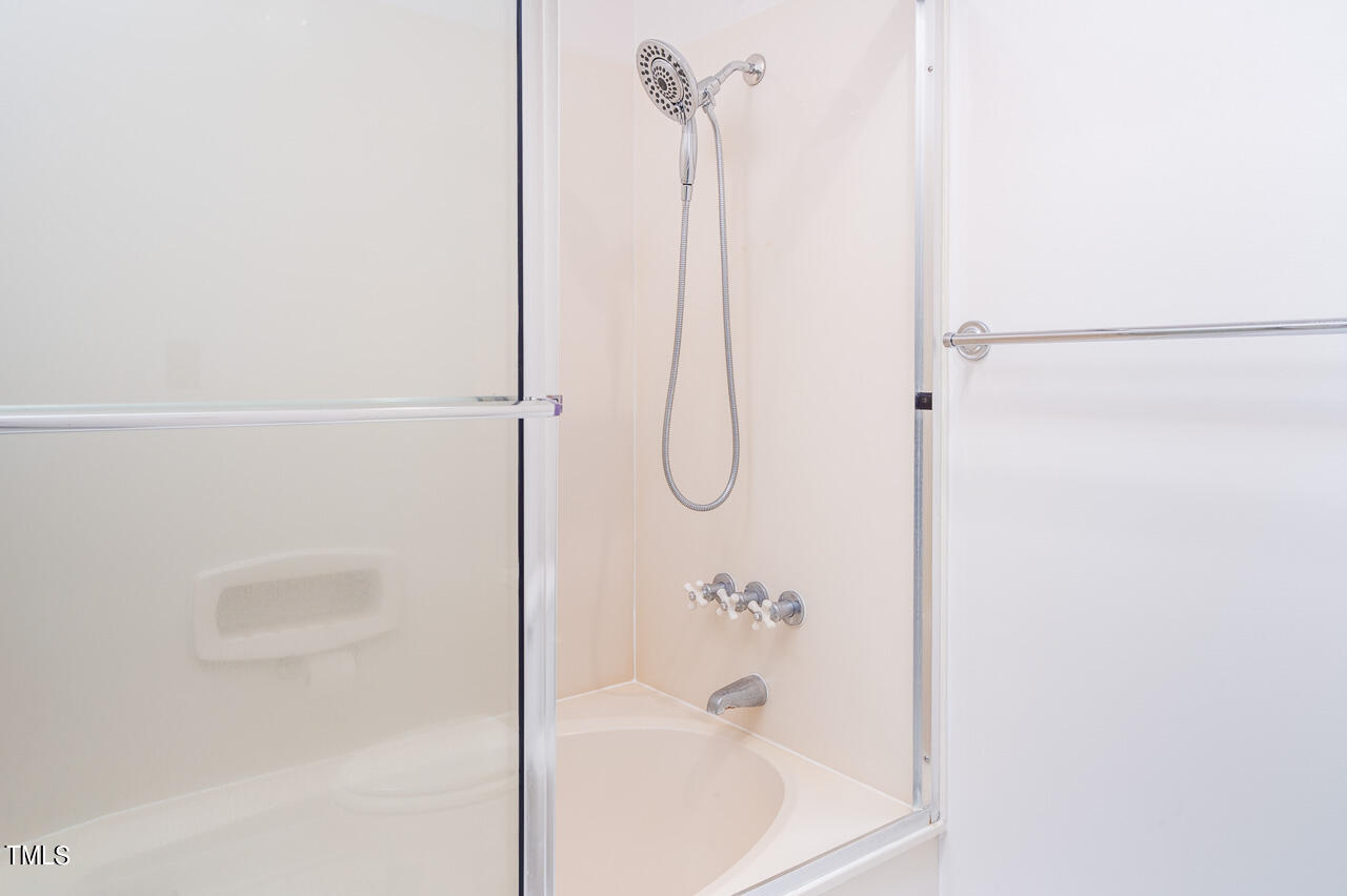 479 Beechmast Pittsboro, NC 27312 - Photo 19 of 22 a bathroom with a bath tub