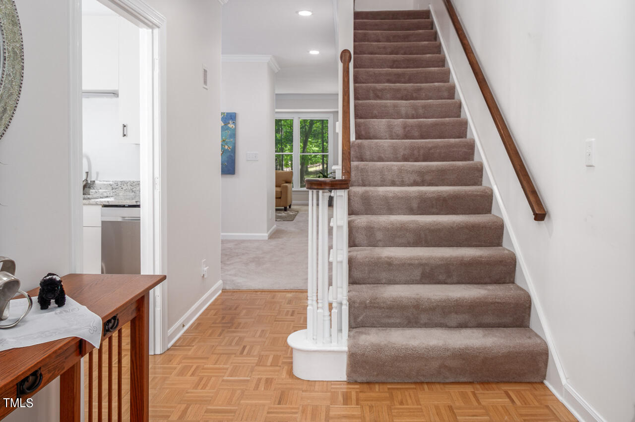 479 Beechmast Pittsboro, NC 27312 - Photo 6 of 22 a view of entryway and hall with wooden floor