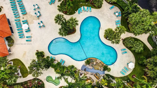 an aerial view of a swimming pool