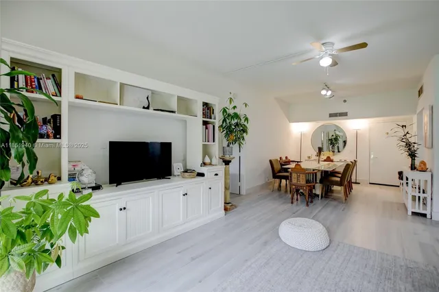 a view of a livingroom with furniture and a fireplace