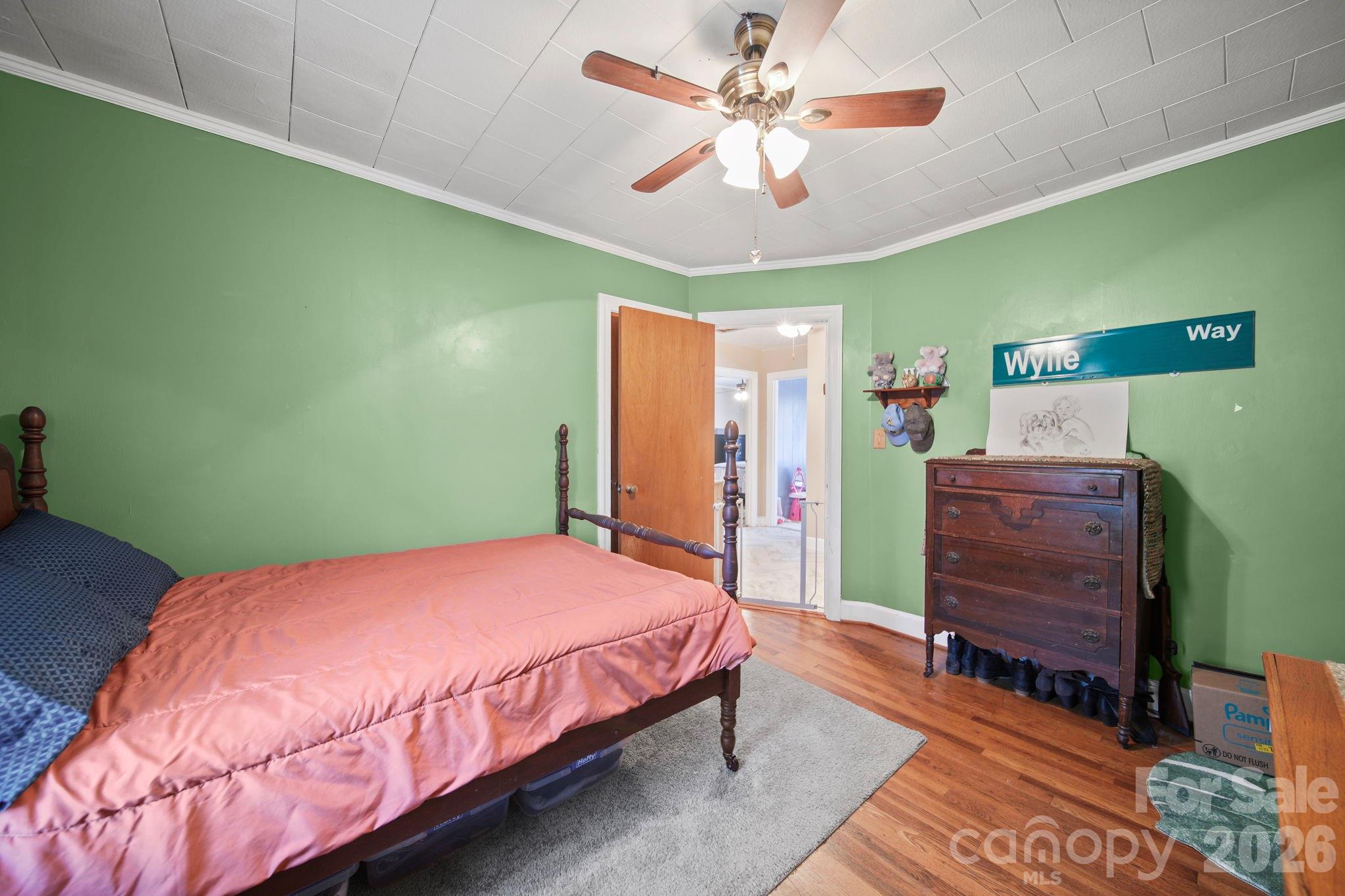 1787 St Johns Church Road Concord, NC 28025 - Photo 19 of 34 a bedroom with a bed and a dresser