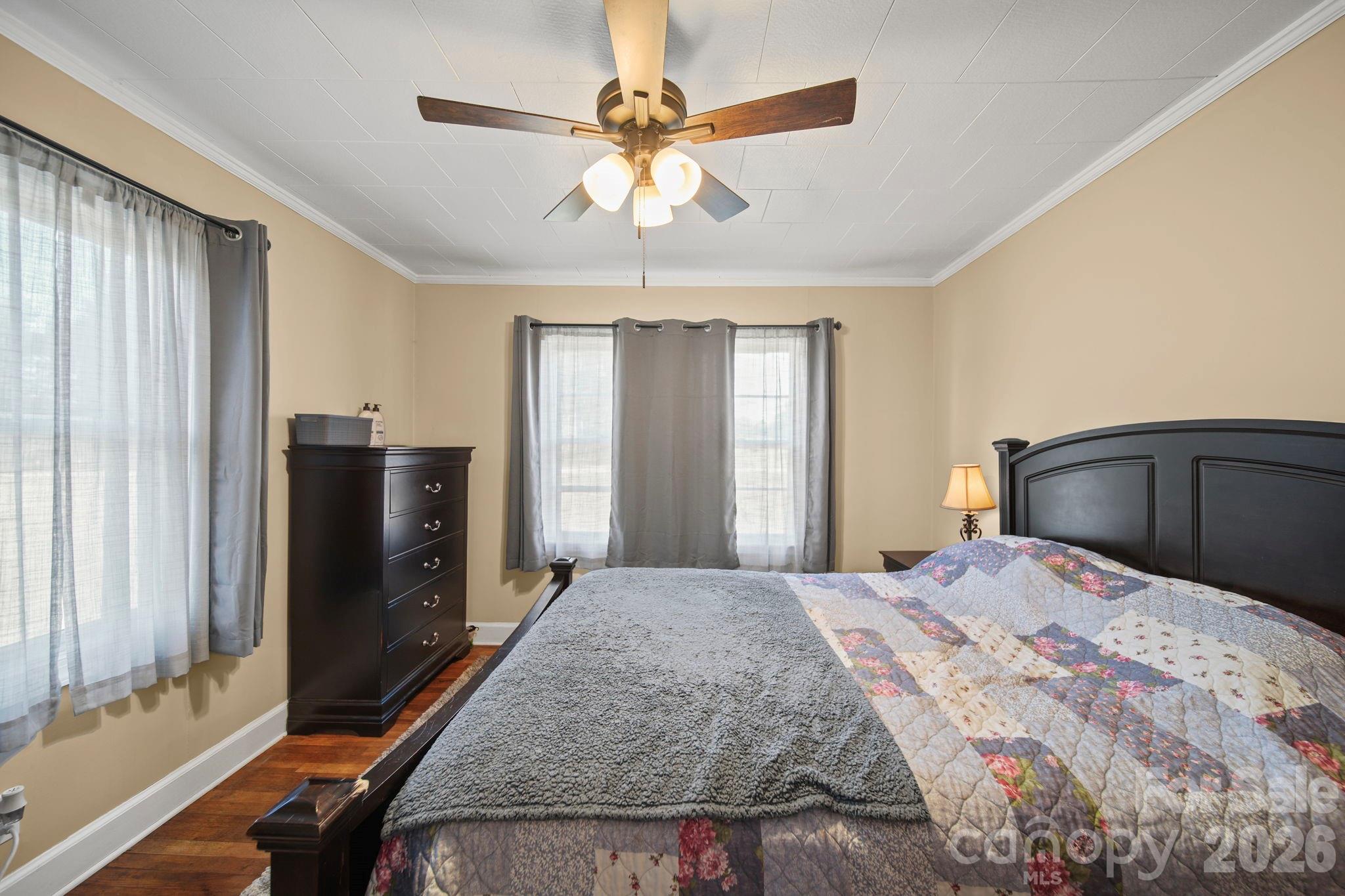 1787 St Johns Church Road Concord, NC 28025 - Photo 25 of 34 a bedroom with a bed and a television