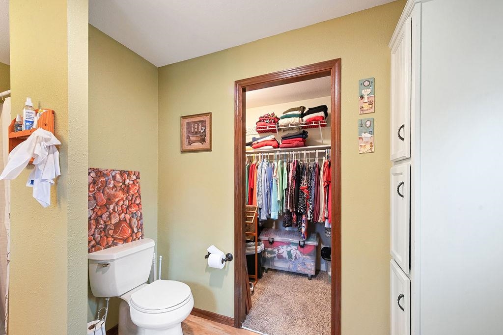 5251 Grabert Road Duluth, MN 55803 - Photo 23 of 50 Bathroom with a walk in closet and toilet
