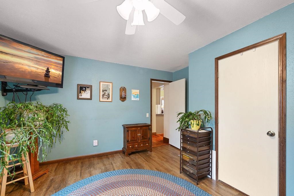 5251 Grabert Road Duluth, MN 55803 - Photo 28 of 50 Living area with wood finished floors and a ceiling fan