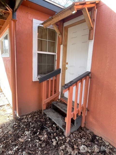 212 West 4th Street Tonasket, WA 98855 - Photo 18 of 24 a front view of a house with a window