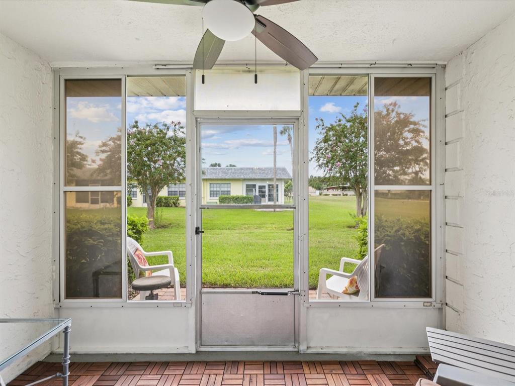 3683 Trophy Boulevard, Unit 7 New Port Richey, FL 34655 - Photo 18 of 42 a house view with a outdoor space