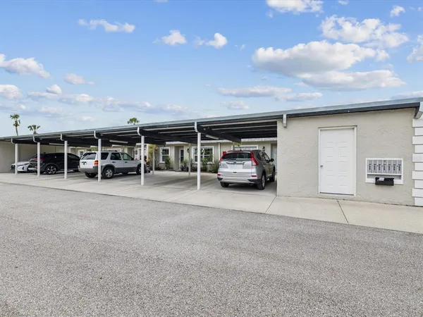 a view of a car parked in front of a building