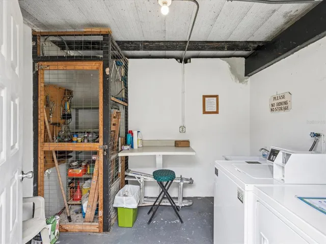 a view of storage and utility room with a sink