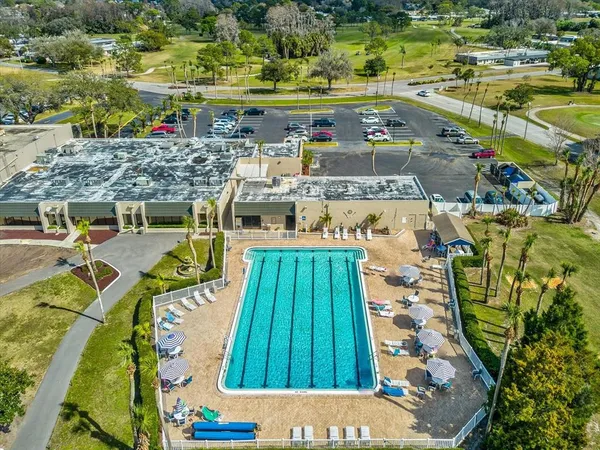 a view of swimming pool with a patio