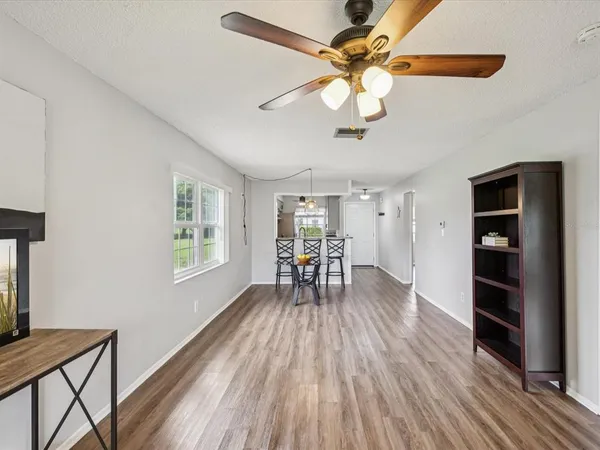 a view of dining room and wooden floor