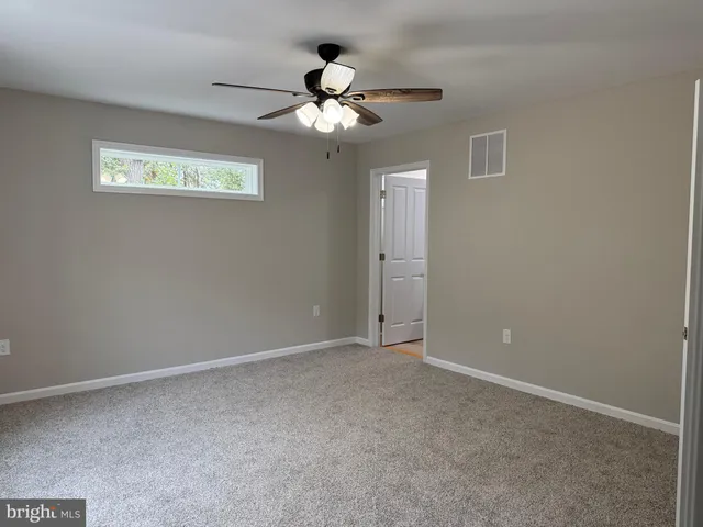 a view of cabinets with wooden floor and cabinet