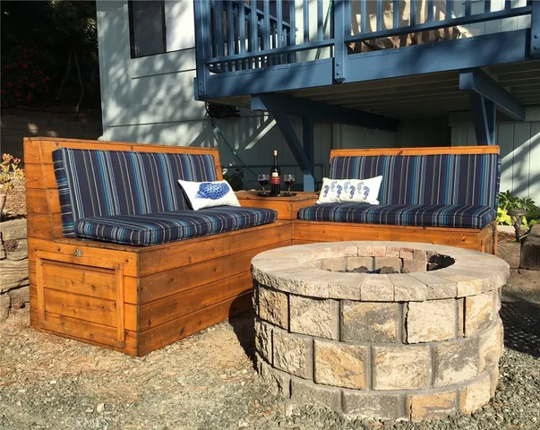 a view of a couches with wooden floor