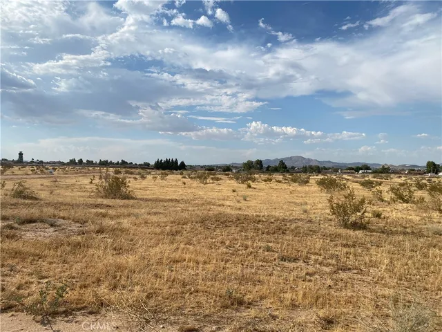 a view of a ocean with beach