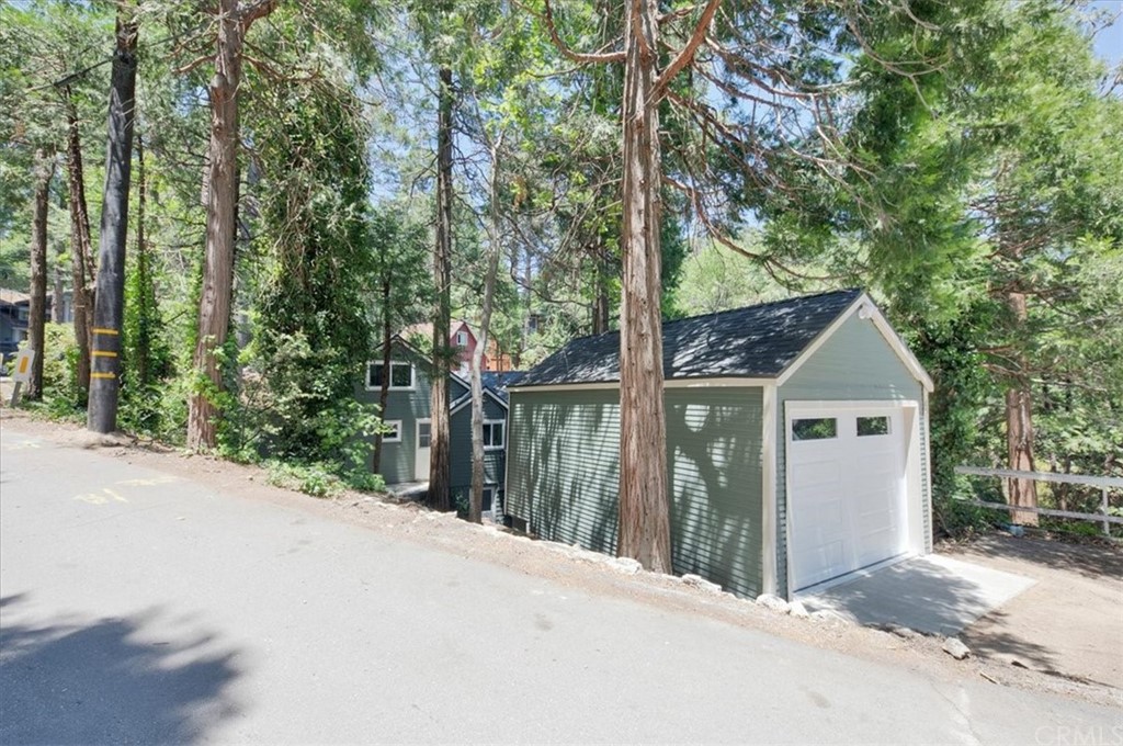 851 High Road Crestline, CA 92325 - Photo 1 of 1 View from the street, garage in front, house tucked away behind garage