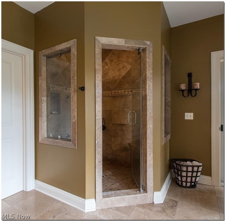 12430 Falcon Ridge Road Chesterland, OH 44026 - Photo 15 of 28 View of walk-in shower...has stone framed
windows and stone bench...just fabulous!
Also equipped with a commercial steam unit. Seller states, best money ever spent!